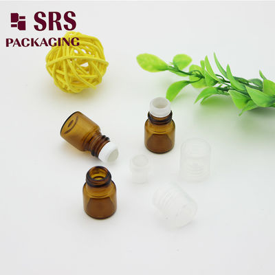 SRS trống cuộn thủy tinh màu hổ phách 1ml trên chai nước hoa với nắp nhựa trong suốt
